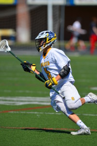 Jake Hodges takes on competition during the Clarkston Boys Varsity Lacrosse team’s home game. Photo submitted