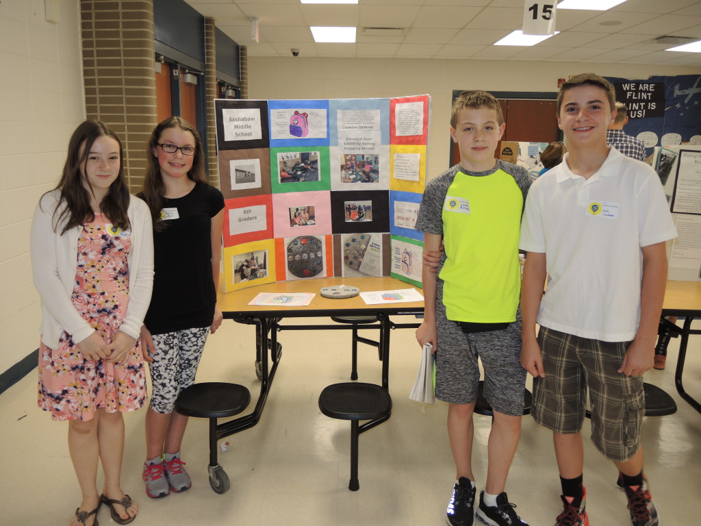 Anna Kuebler, Andrea Luther, Landon Butcher, and Kyle Crockett prepared a presentation on their Stepping Stones ASL project, which benefited Blessings in a Backpack. Photos by Phil Custodio