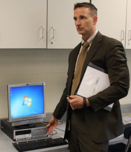 Deputy Superintendent Shawn Ryan discusses the old Windows XP computers in the Math Lab. 