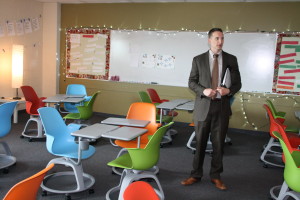 BOND FURNITURE: Clarkston schools Deputy Superintendent Shawn Ryan talks about 21st Century Learning Furniture and shows an example of what they would like to get for some classrooms, if the school bond is approved. Photo by Trevor Keiser. 
