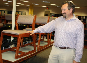 Wes Goodman talks about furniture replacements needed. Photo by Trevor Keiser. 