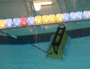 The new robot at work in Clarkston High Schools’ pool. Photos by Trevor Keiser .