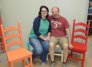 Melanie and Jason Haley’s renovation of the Ace Hardware on Dixie Highway includes a communty room with decoratively painted chairs. Photo by Phil Custodio 