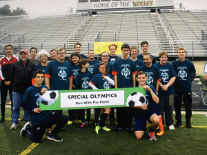 The Rochester Knights get ready for the fourth annual Run with the Pack Special Olympics game hosted by the Clarkston Wolves, Oct. 16. Photo submitted