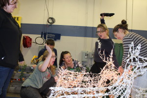 Cyntia Gerst, Alyssa Dubre, Nick Morgan, Emily Jeung, Grace Havel and Haley Velisek celebrate working lights on their float for the parade. Photo by Wendi Reardon Price