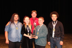 Clarkston Idol winners for 2017, from left, Haley Phillips, Abigail Mundy, Keith Garrison, and Ben Neideck, with teacher Brian Haverkate. Photo provided