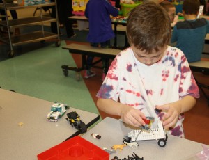 Kindergartener Andrew Fielbrandt building in the Lego competition