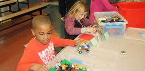 first graders Nathan Moore and Anna Katakowski building in the Lego competition 1