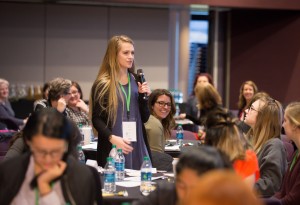 Clarkston High School senior Katie Jaffke shares her “elevator speech” with fellow participants at Our Daughters, Their Future. Photo provided 