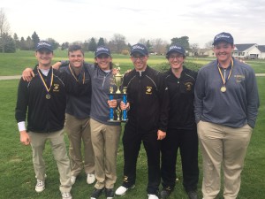 The Clarkston Boys Varsity Golf team smile in celebration after winning their first tournament of the season. Photo provided