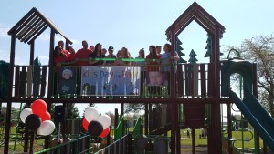 The Ryan Kennedy Memorial Playground opens with a ribbon cutting last Saturday at Clintonwood Park off Clarkston Road. Photo by Wendi Reardon Price