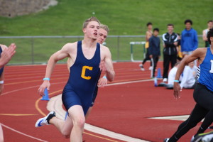 Max Salter runs in the 200-meter dash during preliminary race at the OAA Red league meet. Photo by Wendi Reardon Price