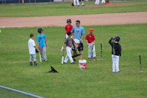 Players prepare for their next station for hitting during Boys Baseball Camp last Thursday at Clarkston High School. Photo by Wendi Reardon Price
