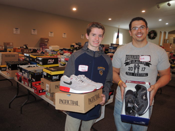 Volunteers fill church for Shoes