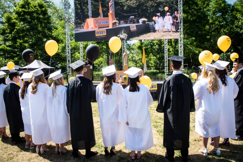 As is Everest tradition, students processed out and received a balloon. Together, they prayed a final decade of the rosary before releasing their balloons just as they did at their kindergarten graduation. Photos provided