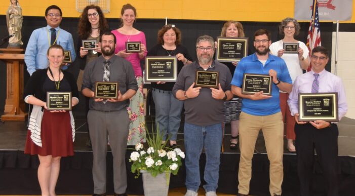 Everest staff, CCS board honored for milestones