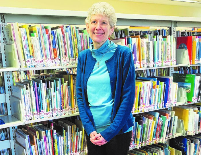 Library director celebrating 25 years